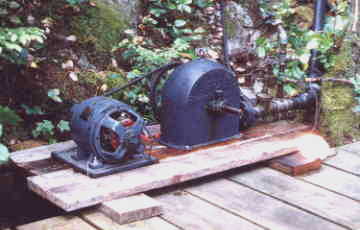 The demonstration turbine producing power to light the flood lamp in forground